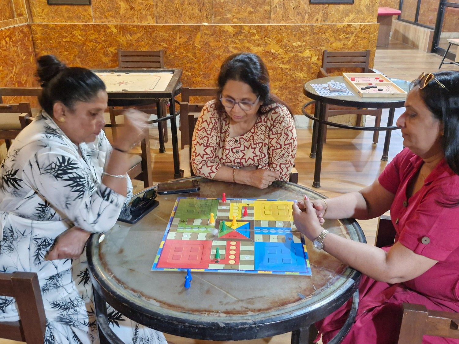 Playing Ludo indoors