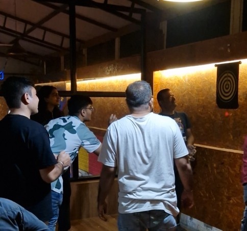 Playing darts indoors