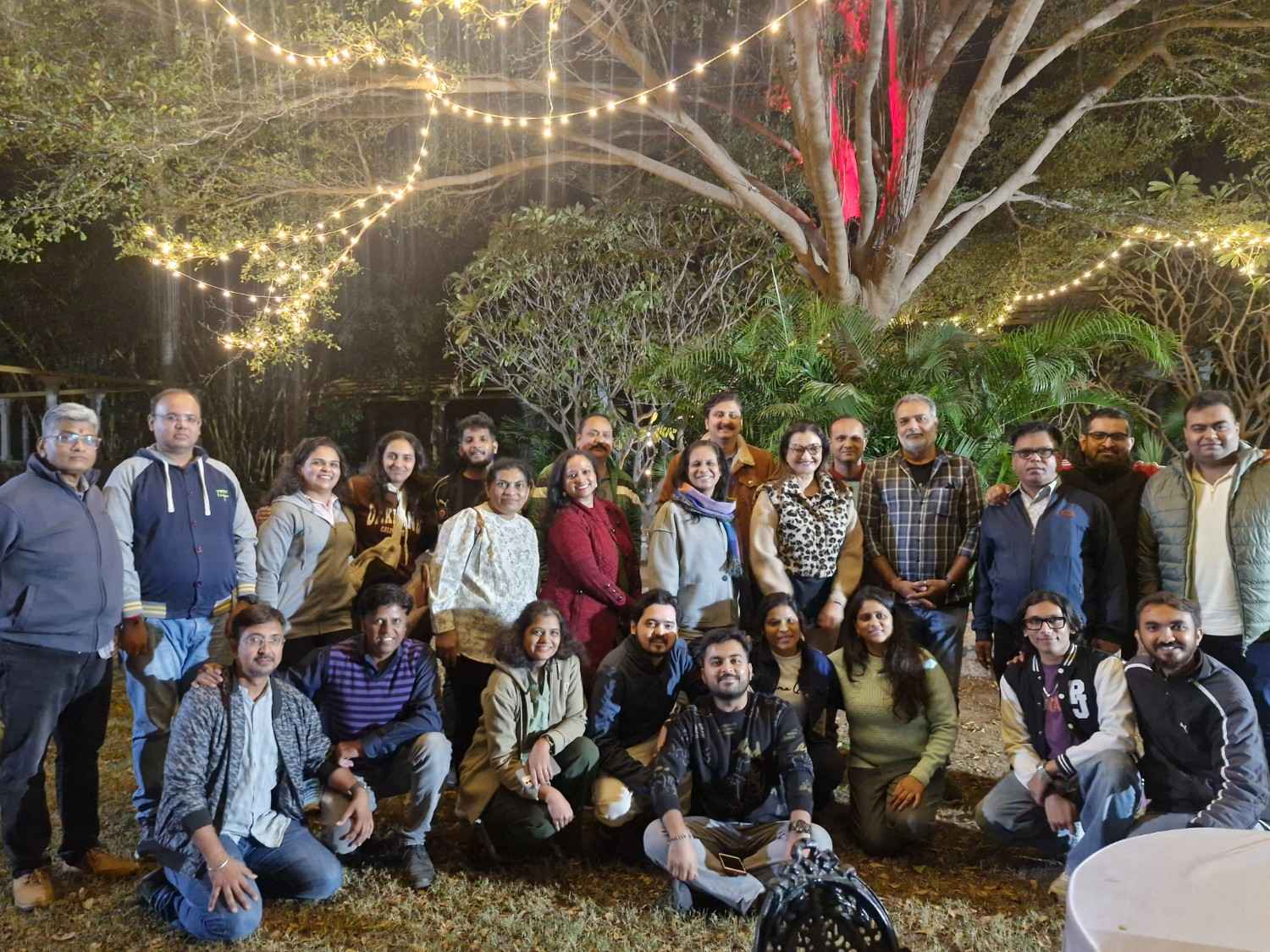 Large group photo at night