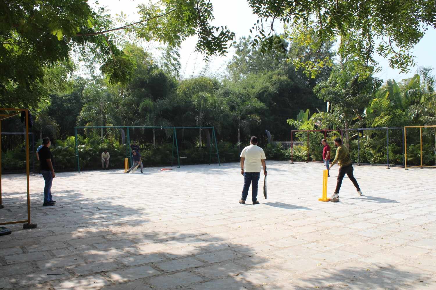 Wide view of corporate cricket match