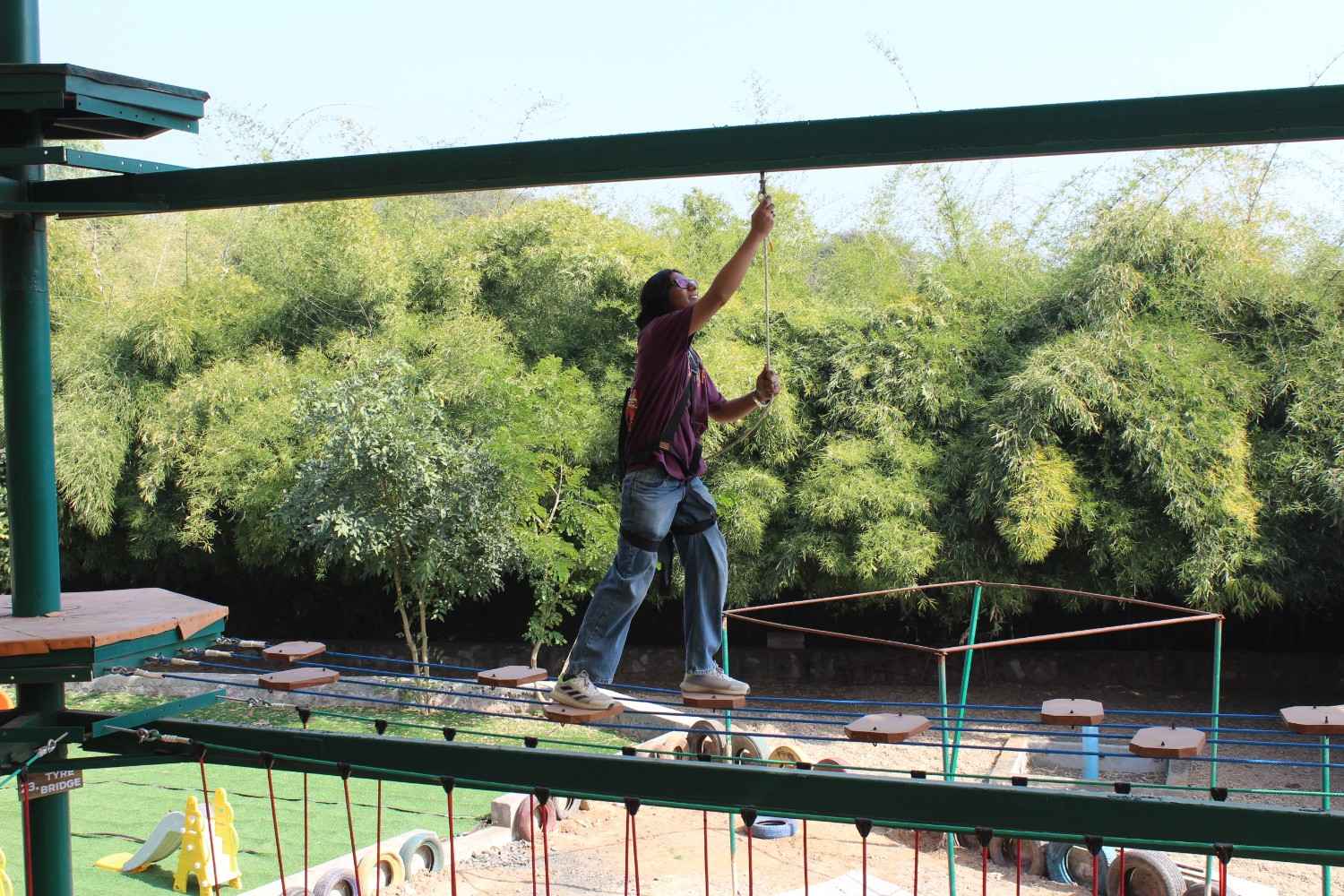Woman on rope balance walk